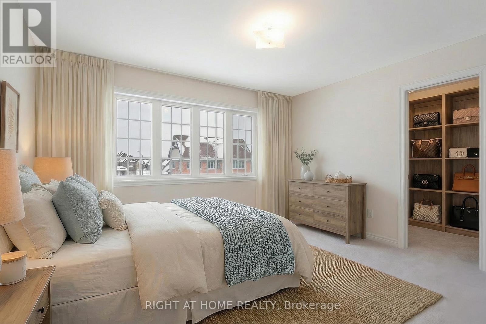 Primary bedroom — spacious, walk-in closet