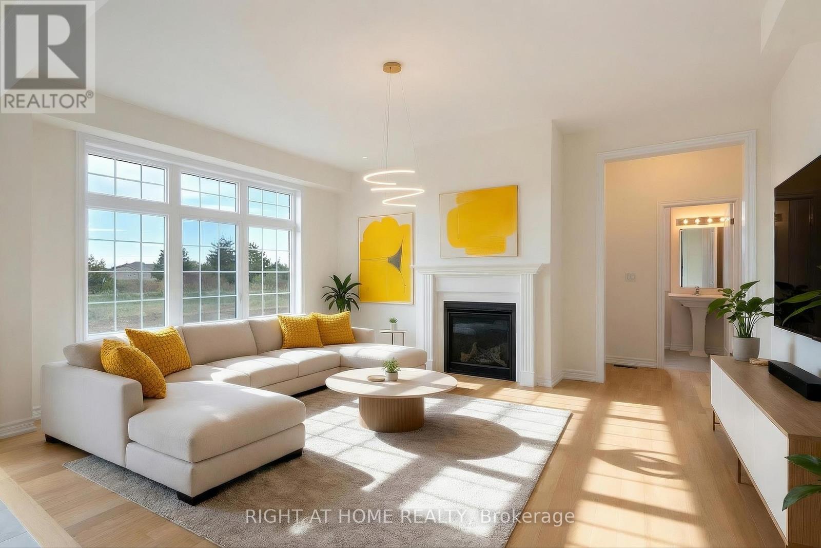 Great room — fireplace, natural light