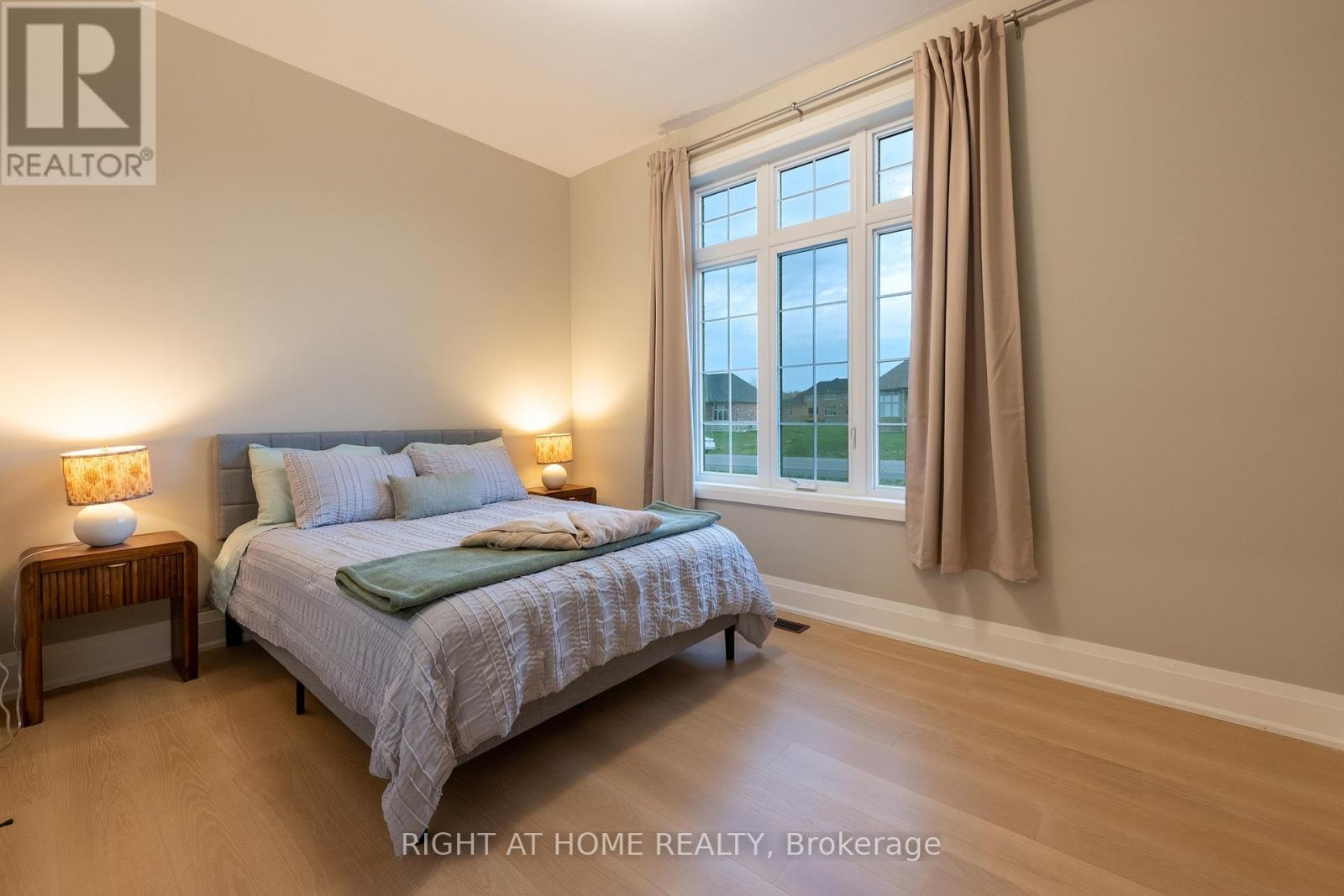 Bedroom 4 — hardwood, water views
