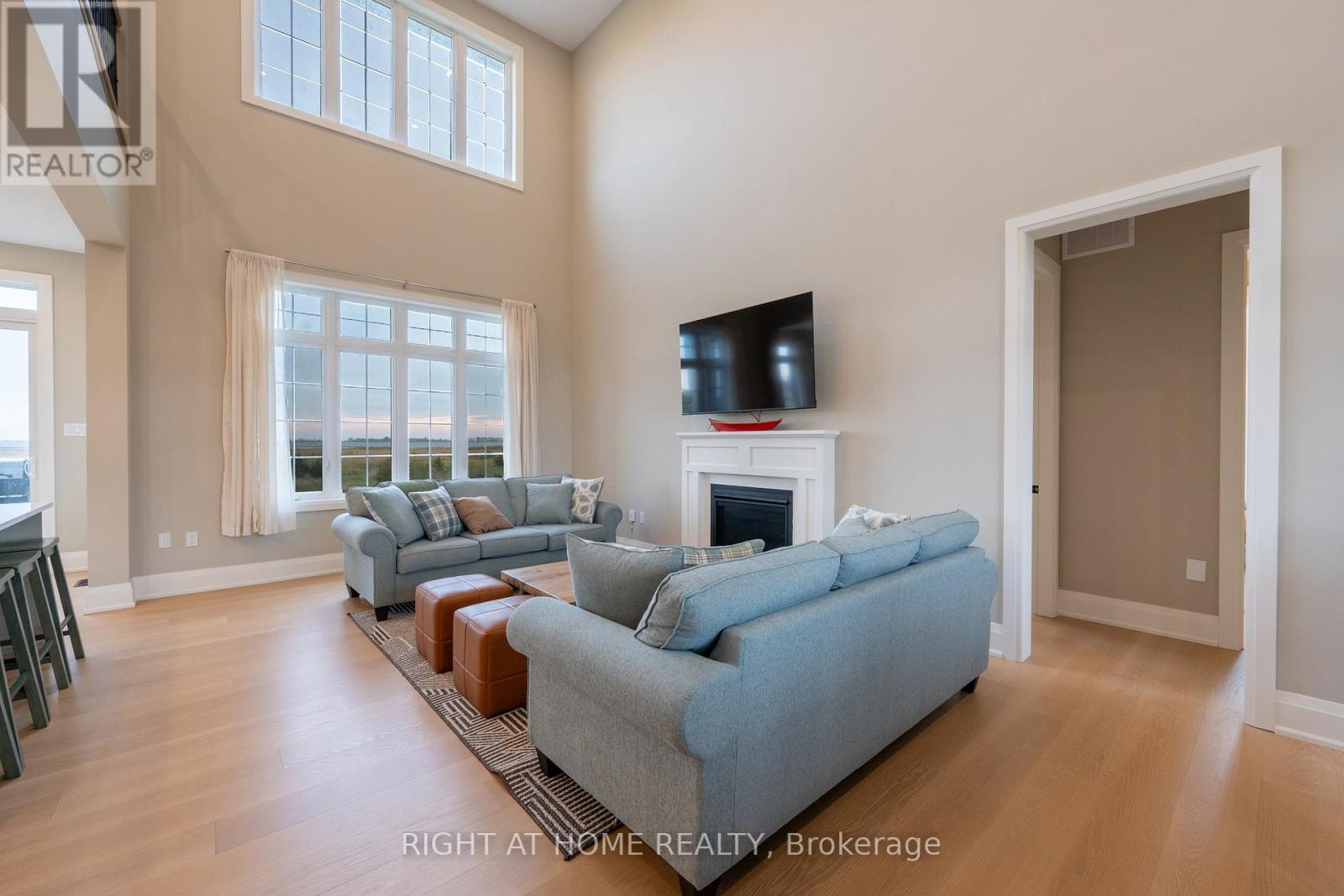 Living area — open concept to kitchen and loft