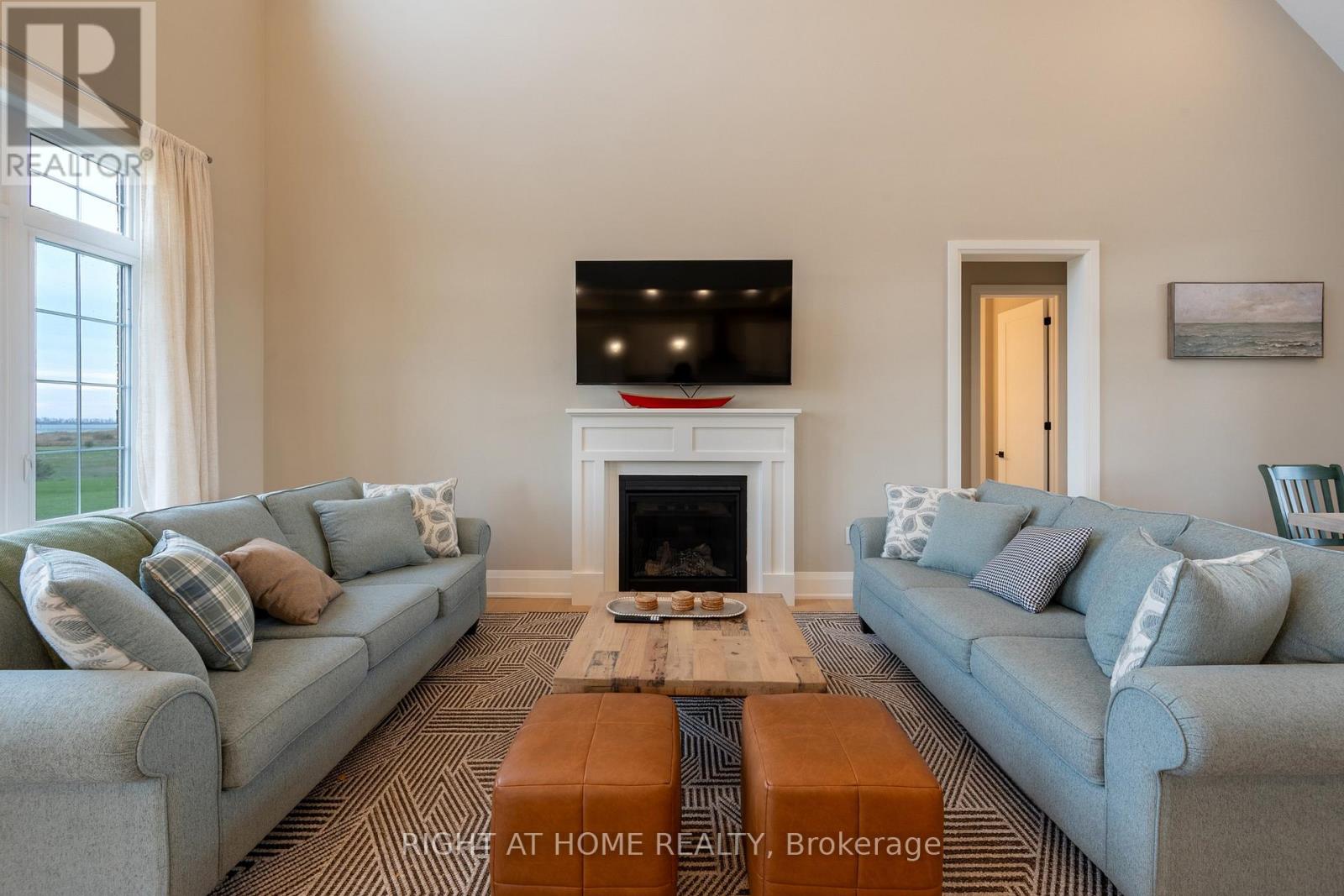 Living room — gas fireplace, vaulted ceiling