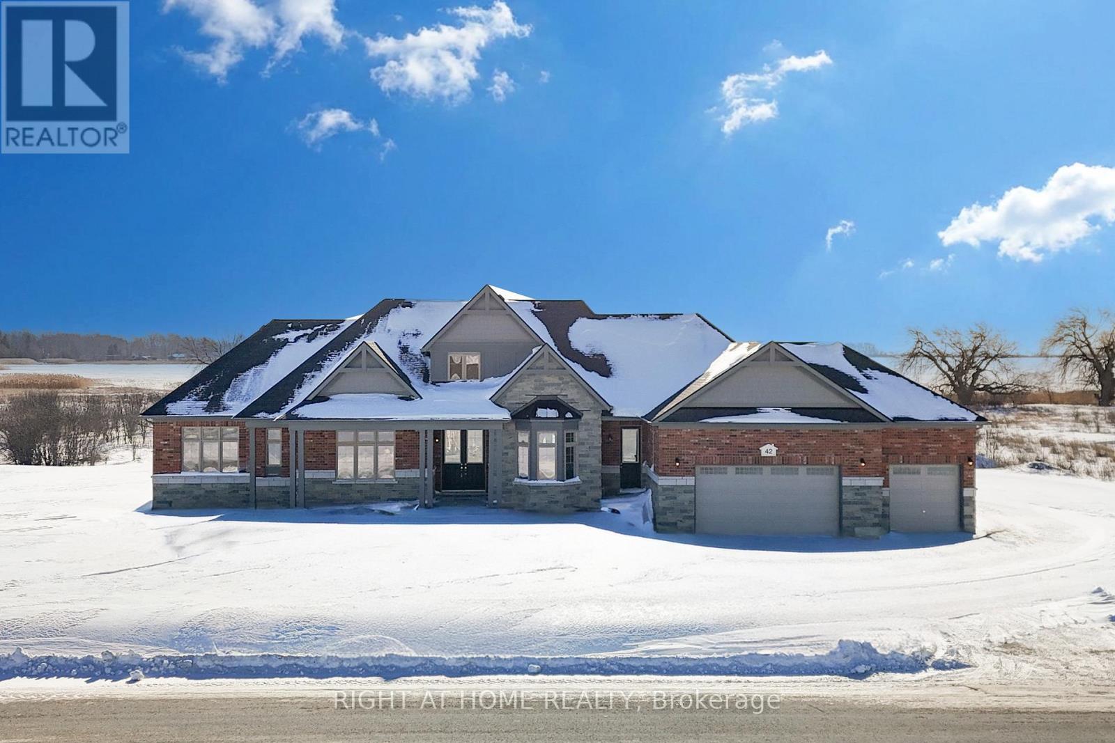 Front exterior — winter twilight