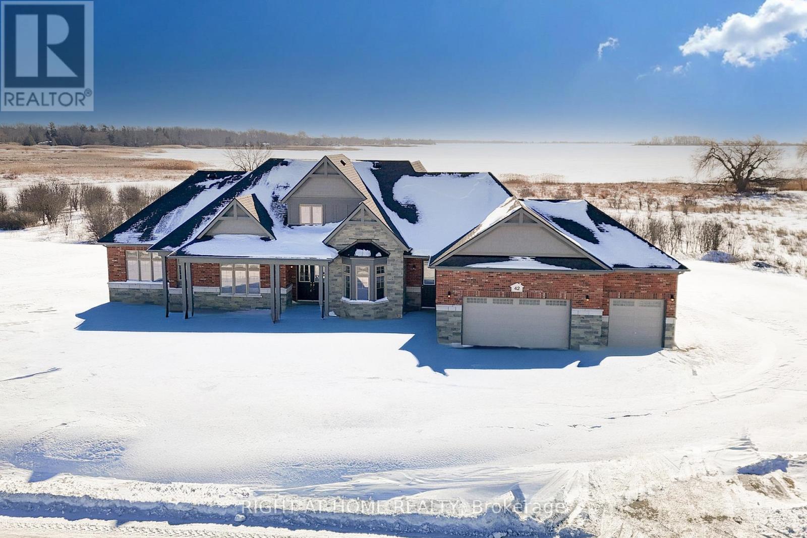 Front exterior — aerial winter view