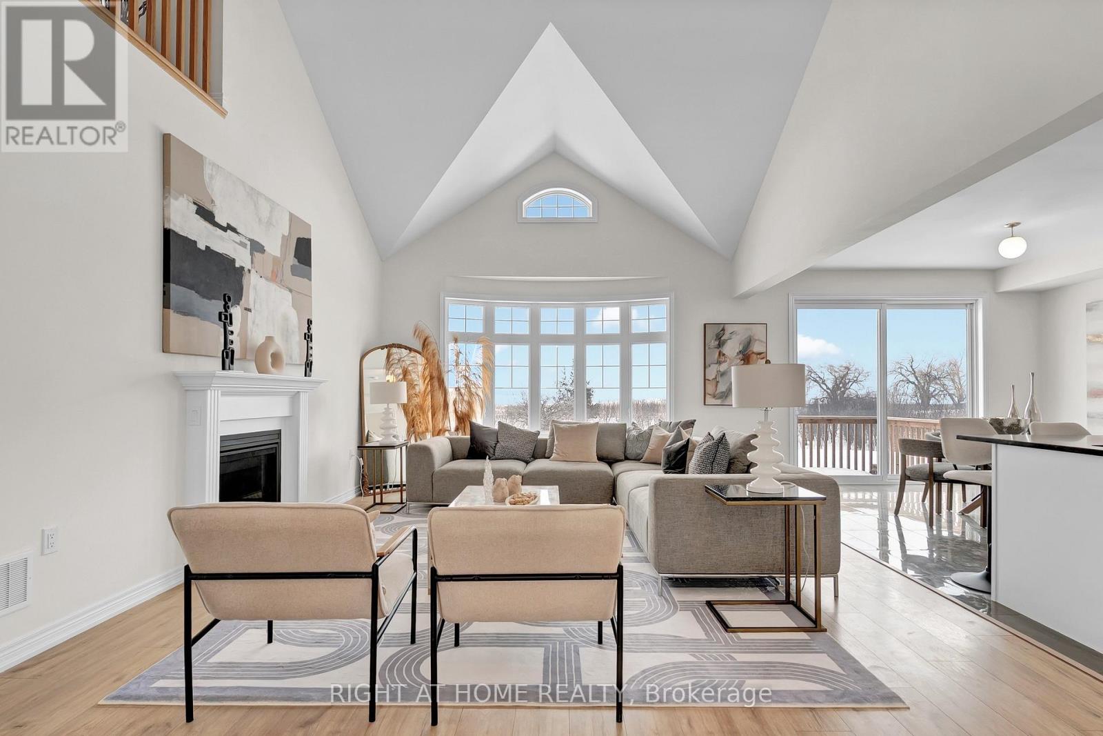 Great room — open concept, hardwood