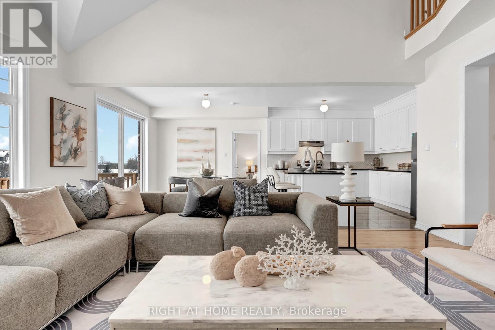 Living area — natural light, large windows