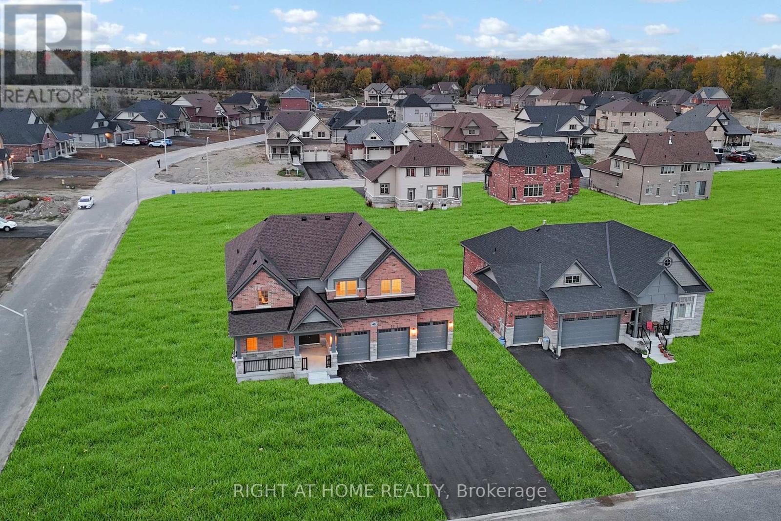 Front exterior — aerial, wider angle