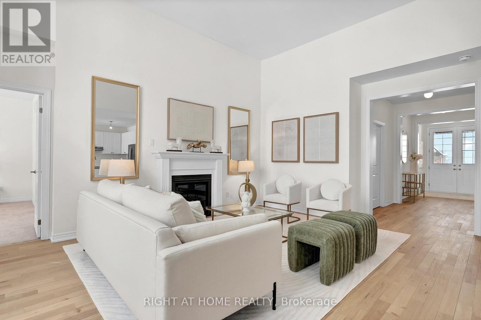 Great room — fireplace, natural light