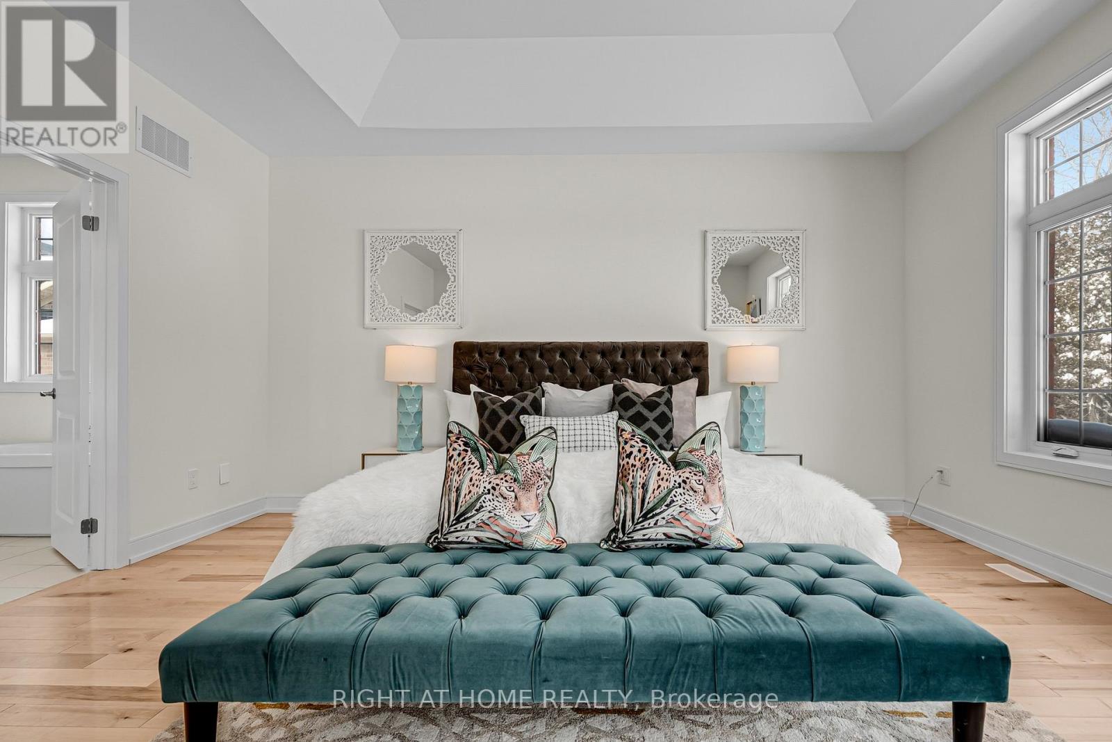 Primary bedroom — spacious layout with ensuite access