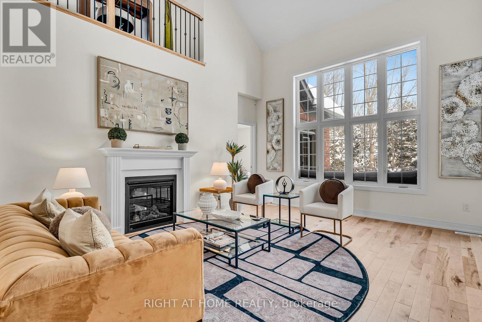 Living area — natural light and hardwood floors